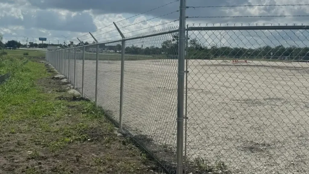 Chain link fence installation in Houston Texas residential property