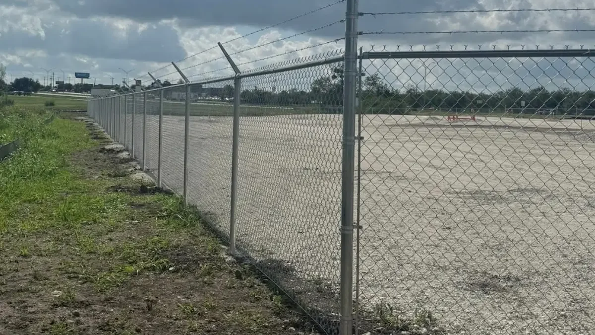 Chain link fence installation in Houston Texas residential property